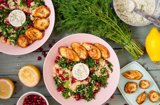 cous cous kale and pomegranate salad with plantains