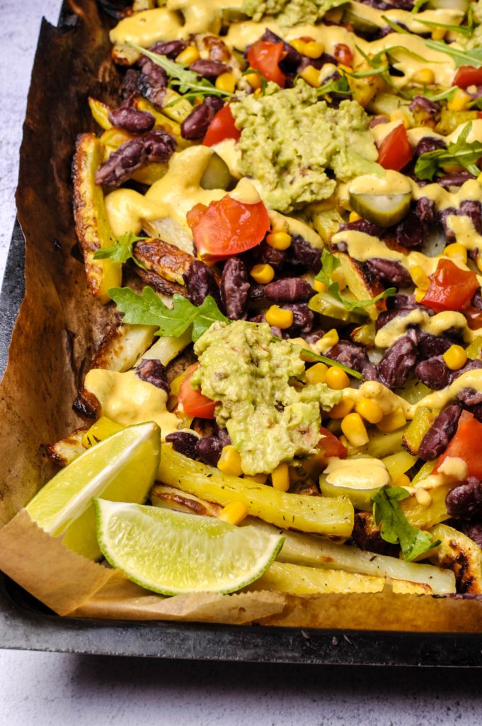 Loaded fries and guacamole with beans